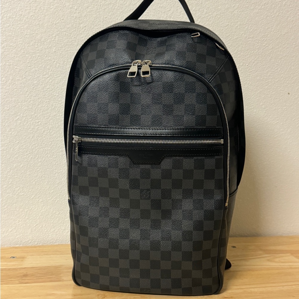 Louis Vuitton Michael backpack with dust bag.